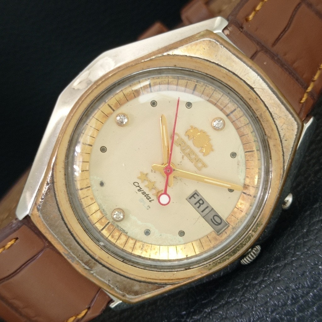 Vintage 1988 Orient Automatic Mens Gold Watch WDaydate  Champagne Accents